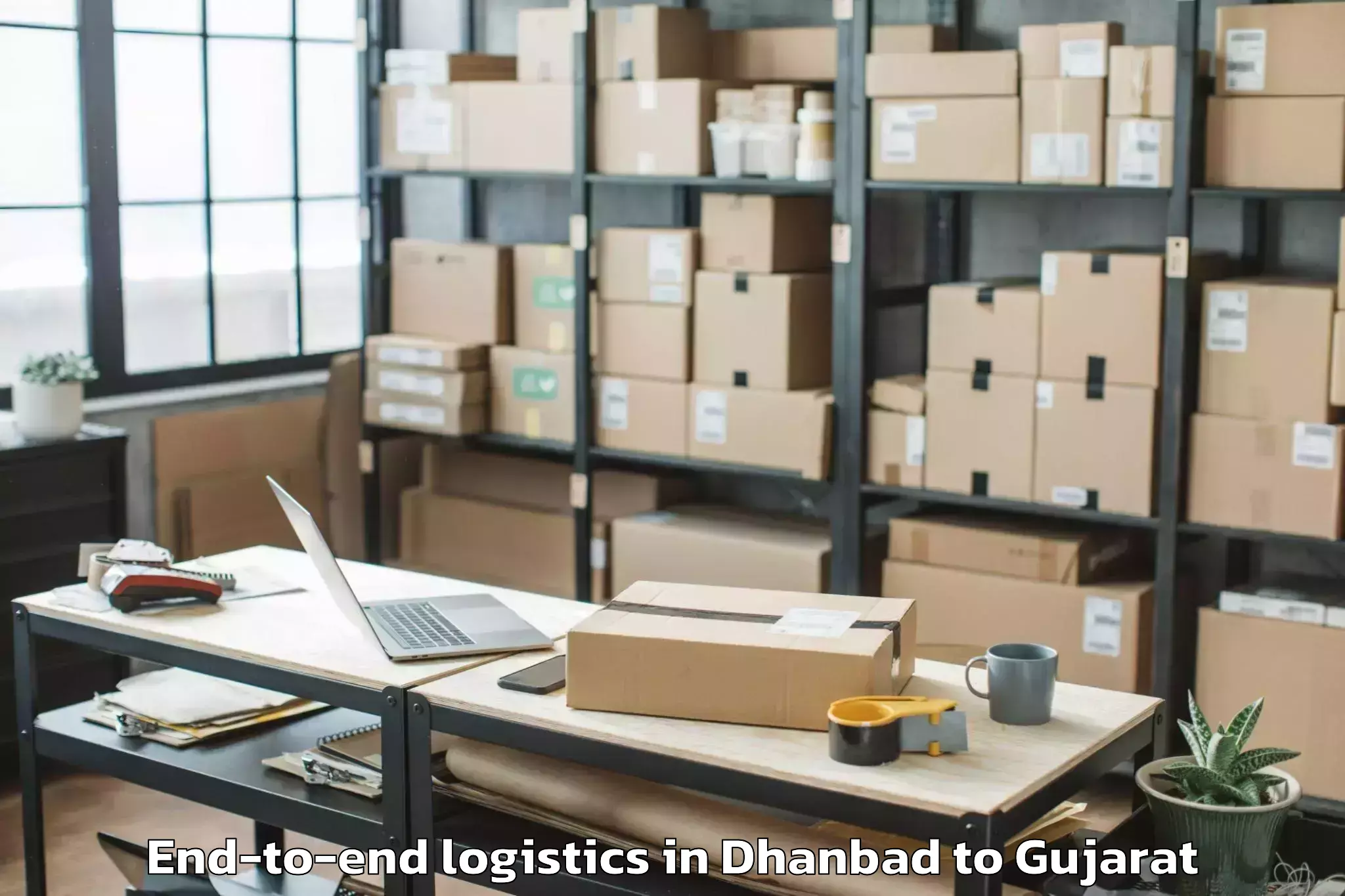 Trusted Dhanbad to Gandhinagar End To End Logistics